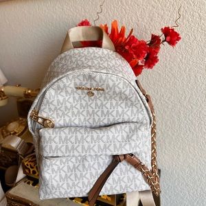 Michael Kors Slater Extra Small Convertible Messenger Backpack Vanilla Logo